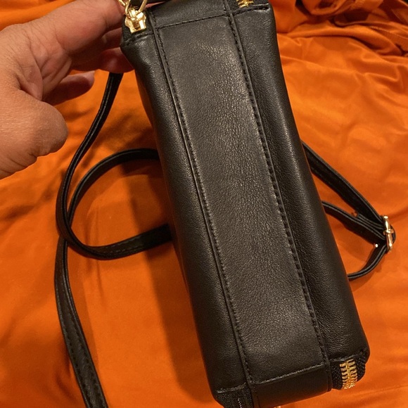 Tumi crossbody bag.
Length is 8.5 inches 
Height is 5.5 inches - Picture 8 of 15
